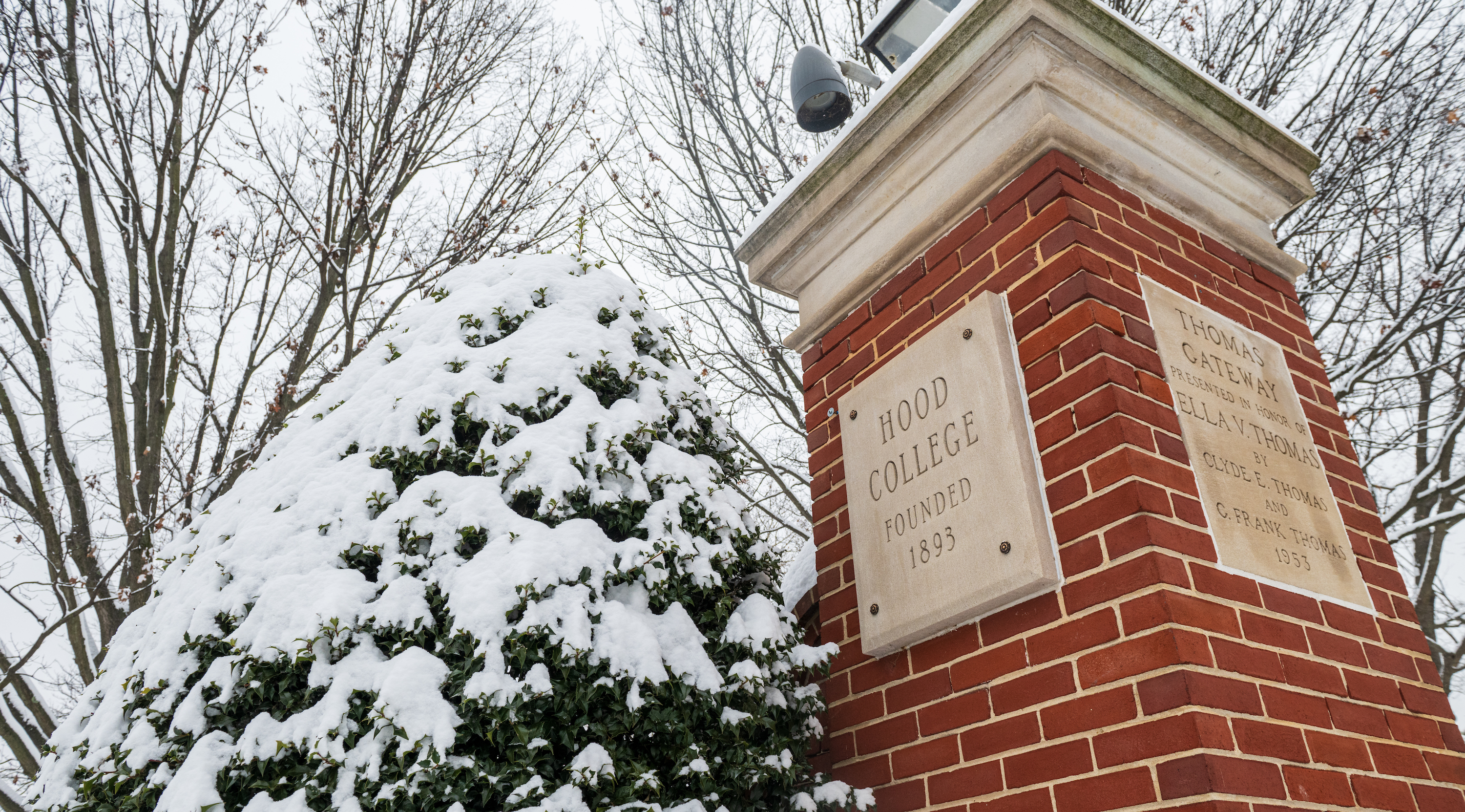 Hood College's front entrance during a snowfall in January