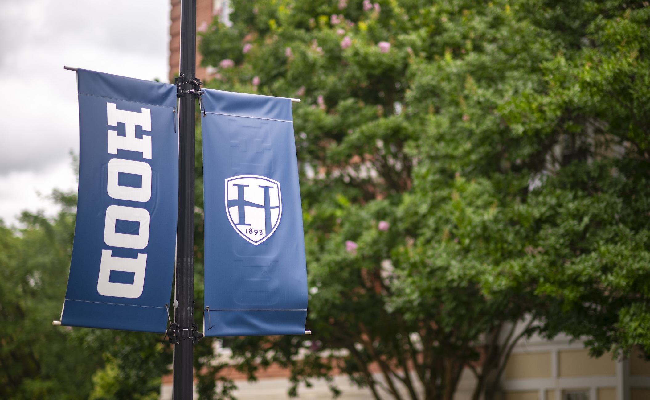 A Hood College banner outside of Shriner Hall 
