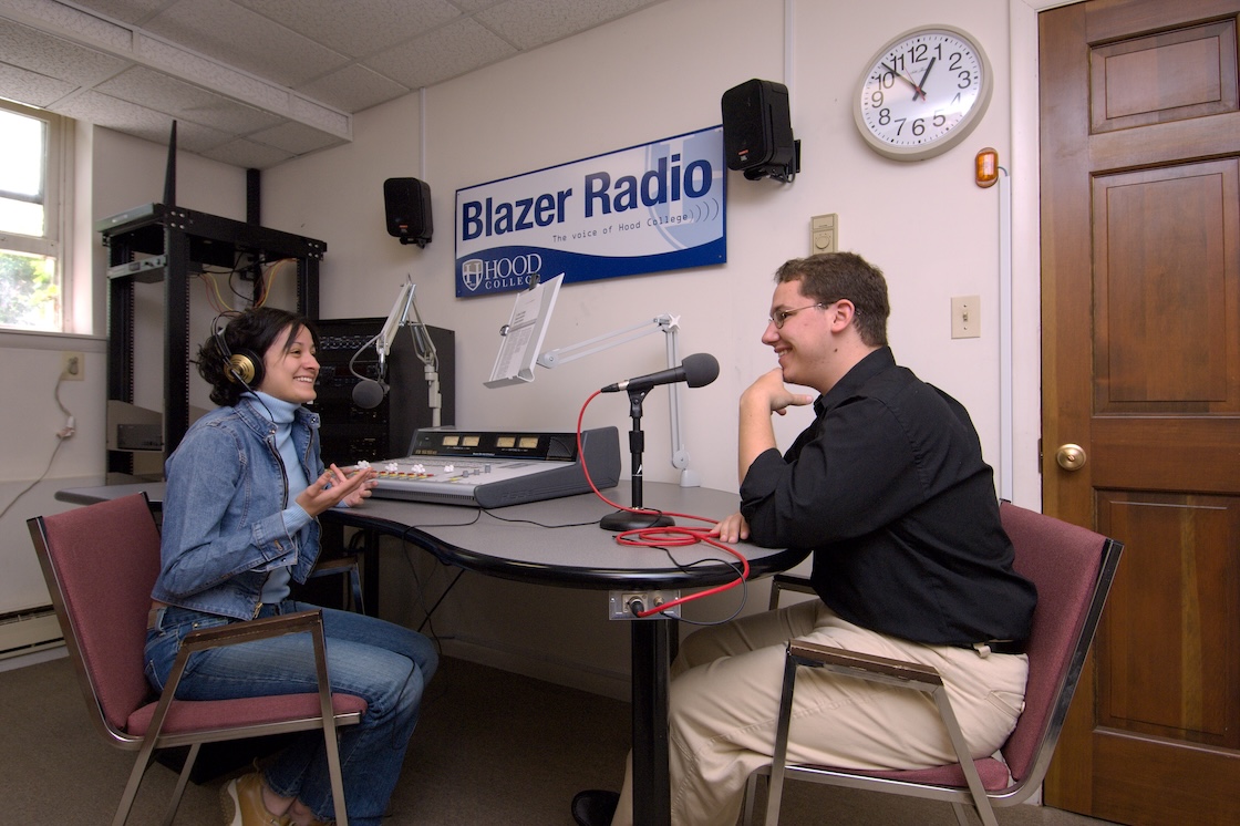 Scott McKinney '07 (right) and Amanda Jimenez '08 (left) work in the Alumnae Hall Blazer Radio studio circa 2006.