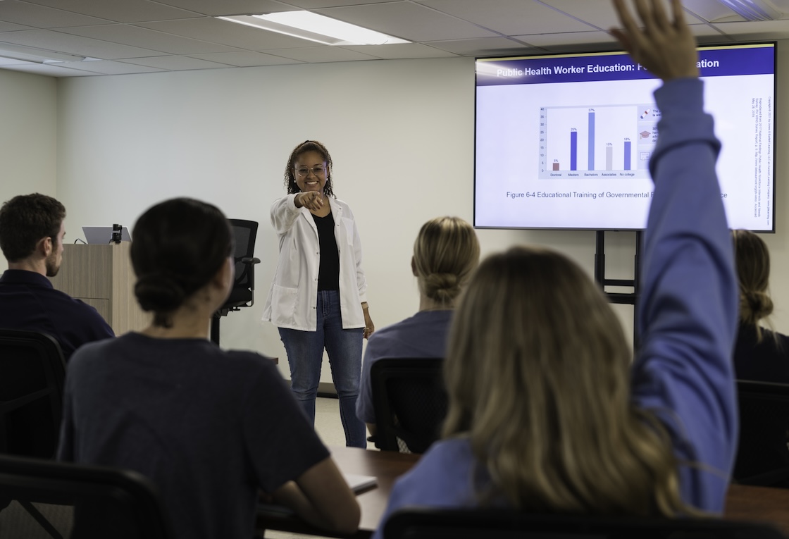 A public health major presenting in class.