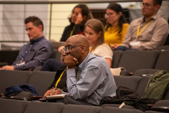 Audience listening to a speaker