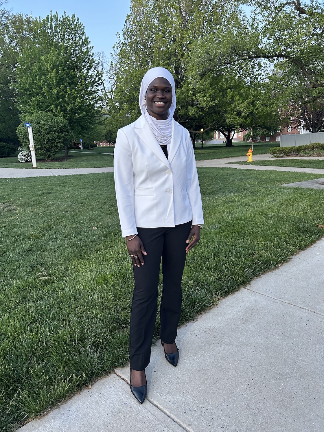 Maimouna Diouf standing on the Quad.