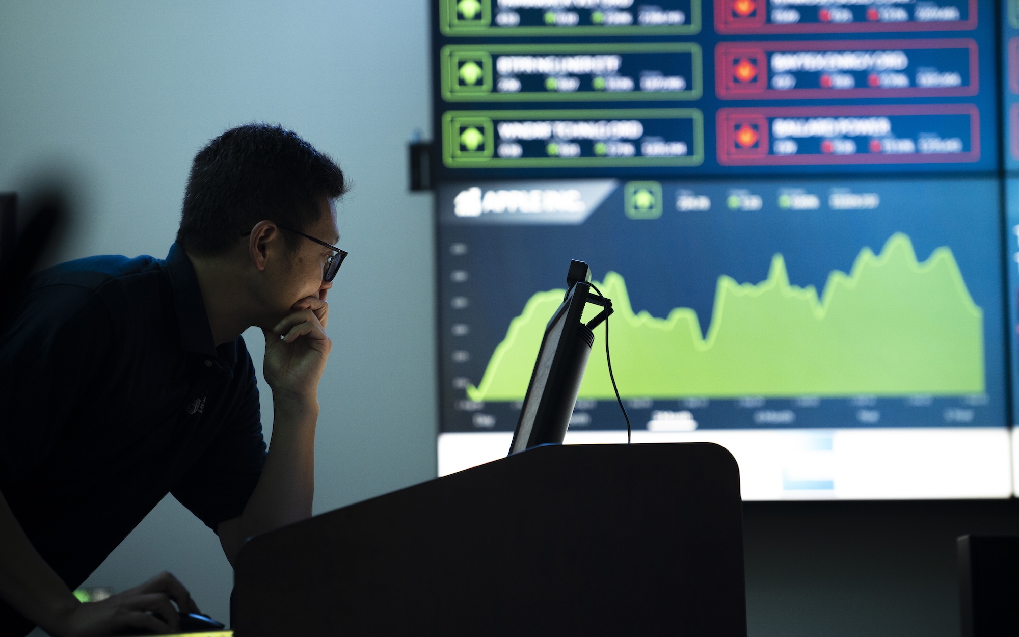 A Hood College professor works in the Virginia Munson Hammell '67 Trading Room