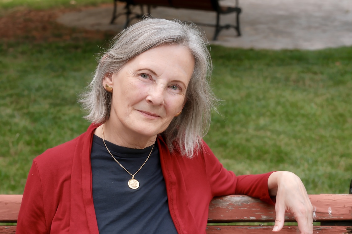 Elizabeth Ambos sitting on a bench.