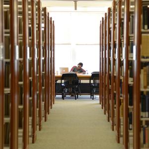 Student studies on the third floor of the Beneficial-Hodson Library and Learning Commons