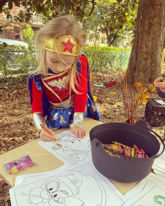 A Lab School enjoying arts and crafts