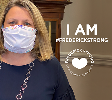 President Chapdelaine in a mask