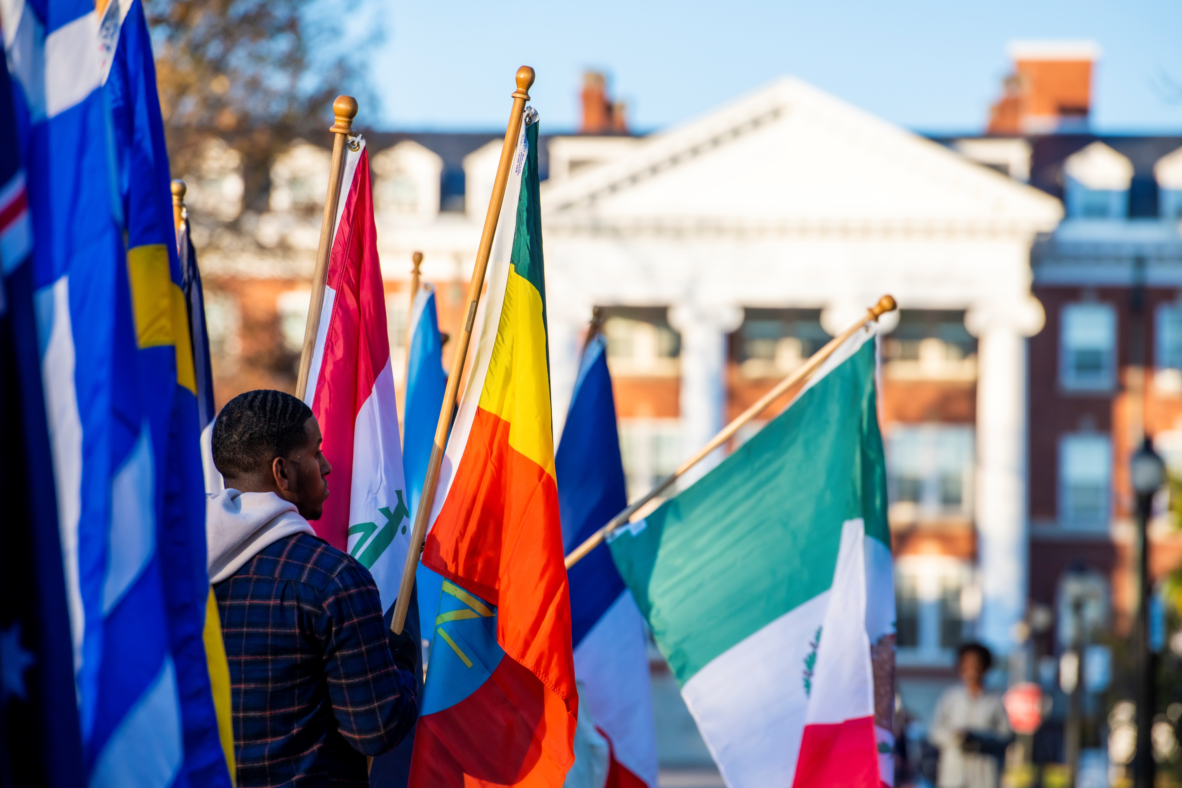 Members of the Hood Community hold flags at the 2022 Parade of Flags