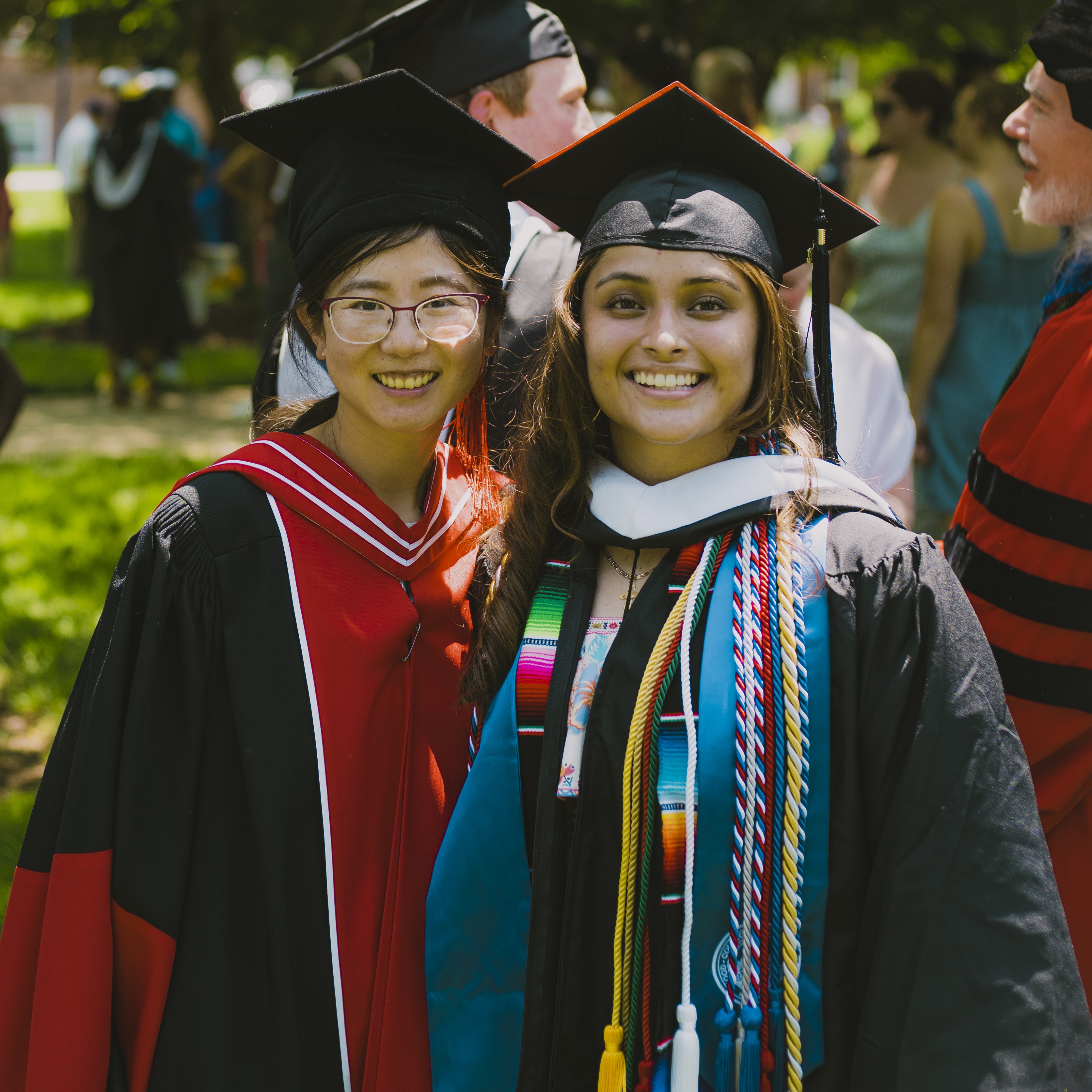 Heidi in graduation gown with Hood professor and advisor