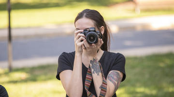 Student with camera