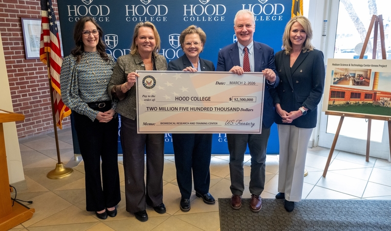 Photo of representatives from Hood College, Tech Frederick, Frederick County and the US Senate hold a large check for $2.5 million dollars