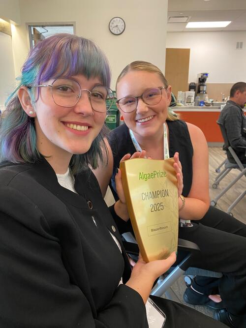 (L-R) Amanda Ambrose '26 and Josephine Sasse ’25 pose with the AlgaePrize trophy