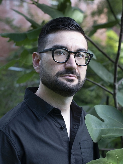 A headshot of Christopher Kondrich