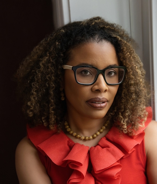 A headshot of Lauren Francis-Sharma