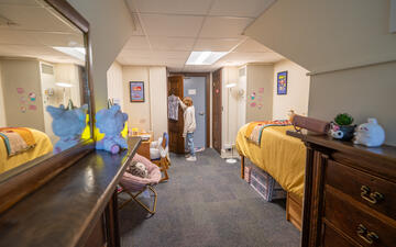 A student living in a single room.