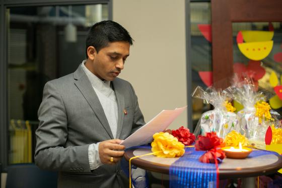 Student reading at Diwali