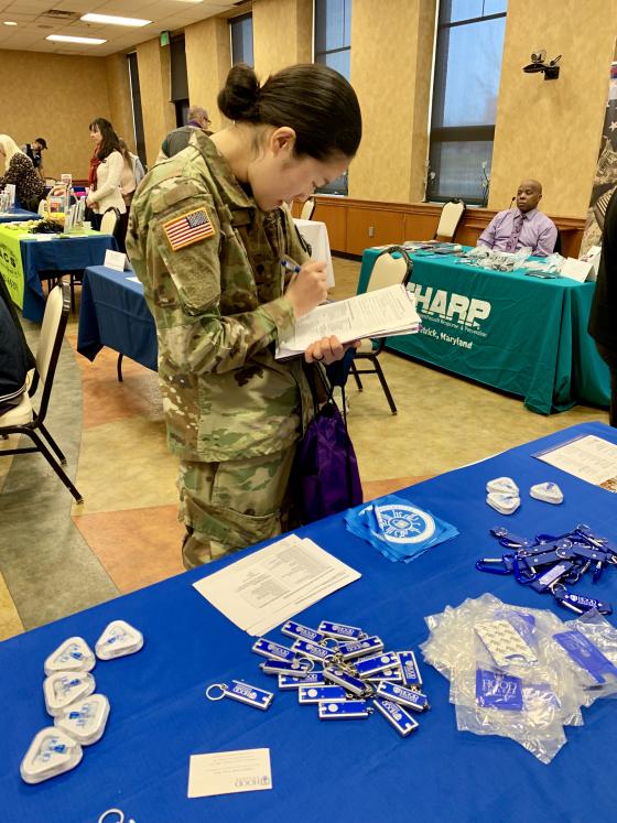 Fort Detrick soldier at Hood table