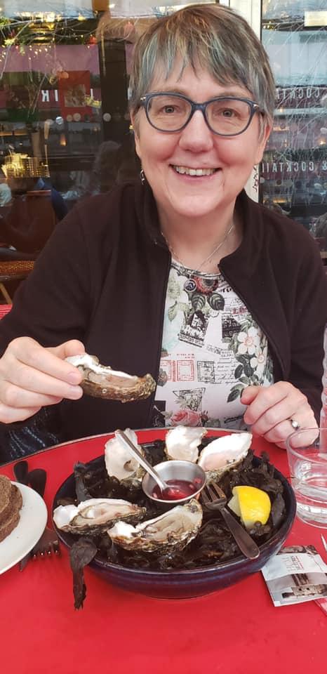 Lisa Marcus eating oysters in Paris, Jan 2020