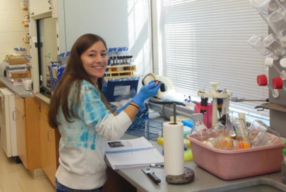 student in lab for energy research