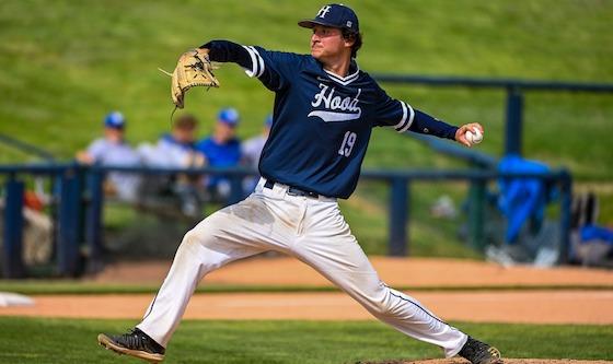 Gavin Pollard throws a pitch on the baseball field.