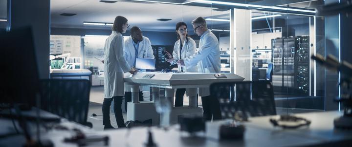 A group of health information technicians working in a lab.