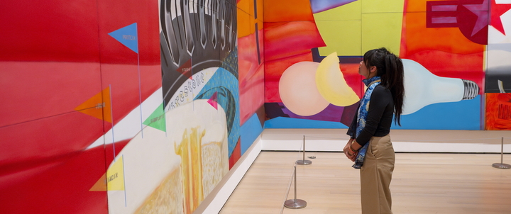 A Hood student standing in an art gallery.