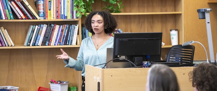 A student presenting research at SPIRES.