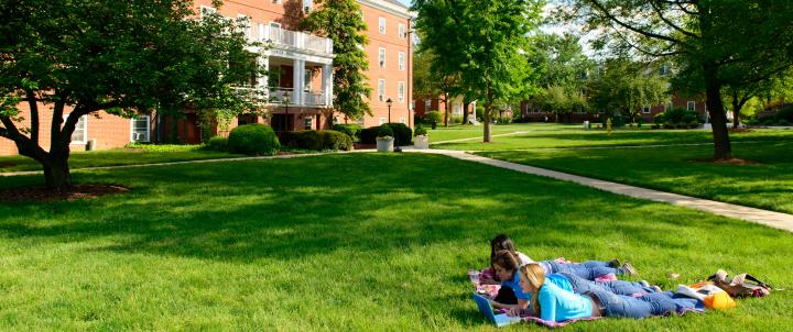 Students laying on quad