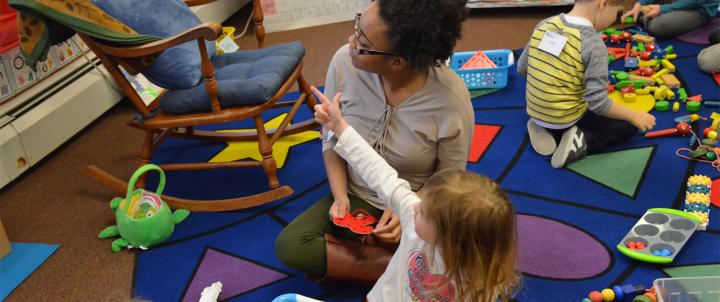 Student teacher with preschooler