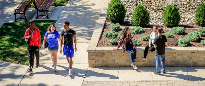 Students walking through plaza