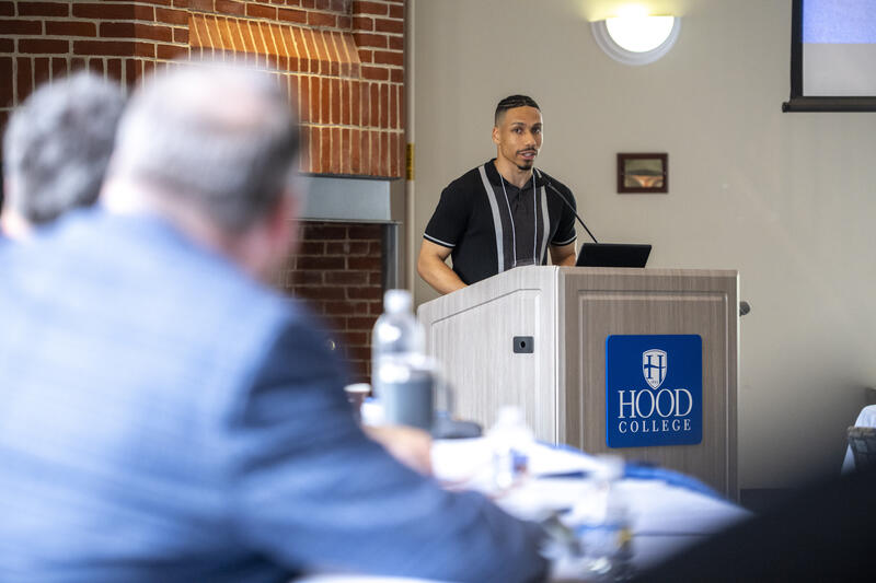 EPCC Event: Student Presenting to a Board of Pitch Competition Judges.