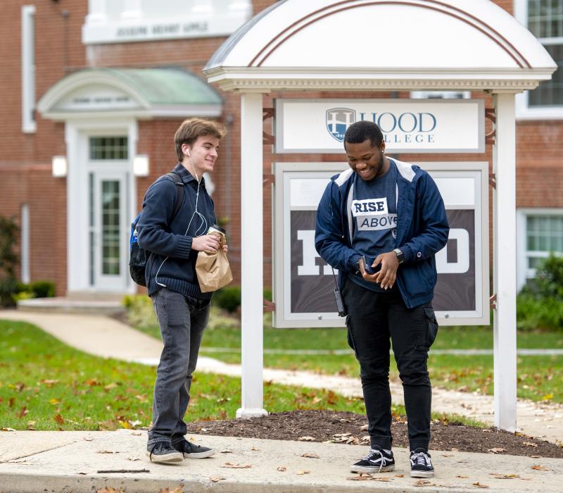 Male students laughing